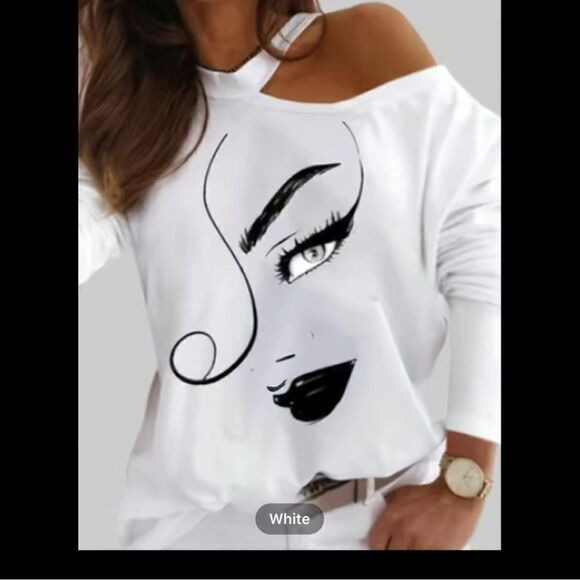 Cold shoulder, long sleeve polyester Top. With sexy eye smirk. - Picture 2 of 8